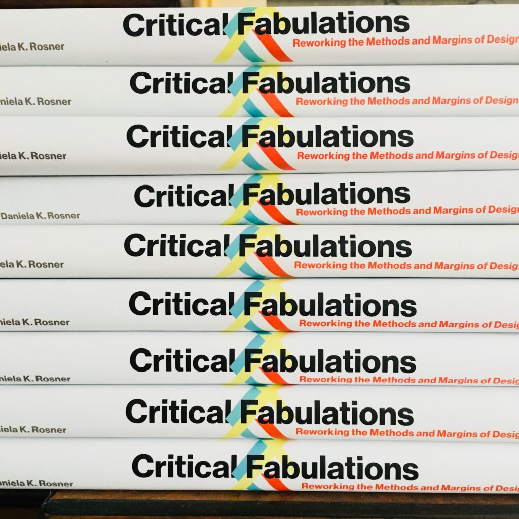 Photo of 10 copies of Critical Fabulations book
